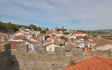 Obraz premium Óbidos - Medieval old fortified city in Portugal with well-preserved castle and walls. 