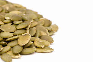Shelled Pumpkin Seeds on a White Background