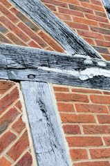 Traditional English oak wood timber framed brick construction, with wooden pins