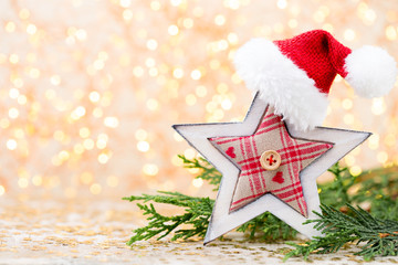 Christmas background. Christmas star and santa hat. Greeting card.