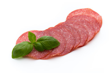 Salami slices isolated on white background.