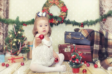 little girl and Christmas tree