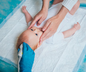 Doctor and little boy patient. Ultrasound equipment. Diagnostics. Sonography.