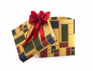 Gift box with a red bow for the new year on a white background