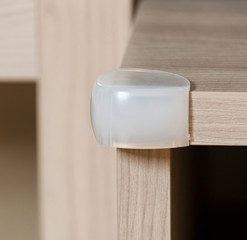 Corner protector in rubber for small children.