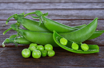 Snow peas on wood