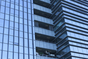 Fototapeta na wymiar Architecture details, Modern Building Glass facade