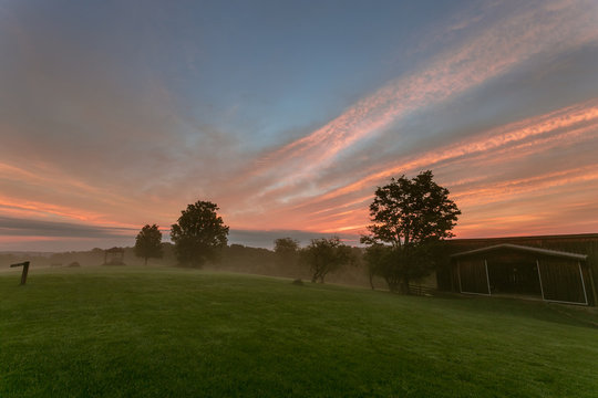 Misty Morning Sunrise over Barn / Meadow / Field