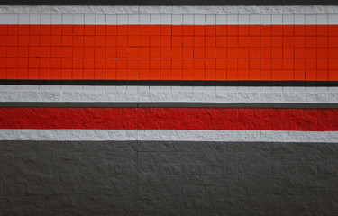 Texture of a wall from tiles and bricks