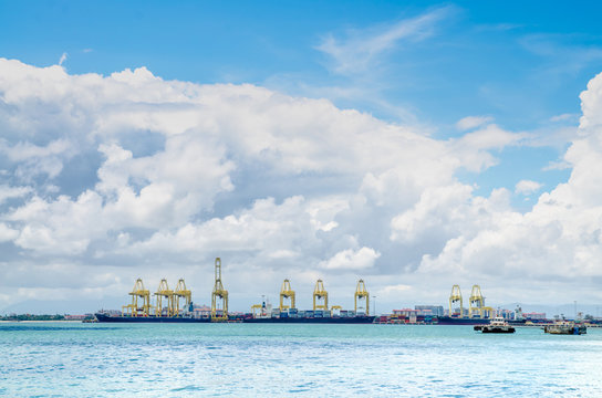 port cranes ships. bulk carrier ship in the port on loading.