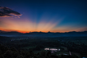 Sunset behind mountain in suburb Chiang mai, Thailand.