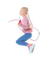 Obraz premium Adorable girl skipping rope, isolated on white