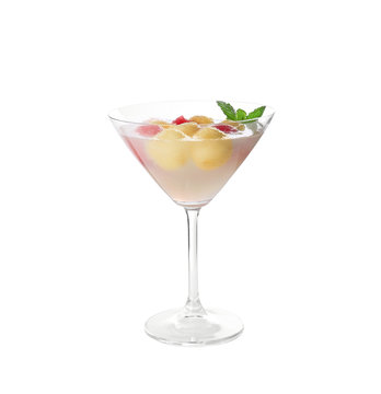 Cocktail glass with melon ball drink on white background