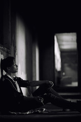 A young man takes drugs