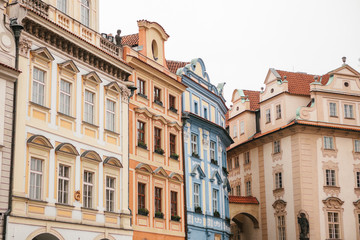 Close-up of beautiful historic buildings standing tightly together in the main square in Prague