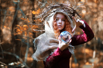 Fortune-teller conducts a ritual autumn