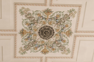 An ancient figured molding on the ceiling