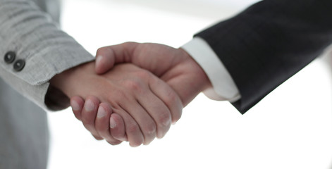 Obraz premium Business people shaking hands isolated on white background