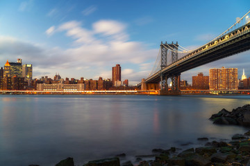 Naklejka na ściany i meble Manhattan bridge and Manhattan after sunset, New York City