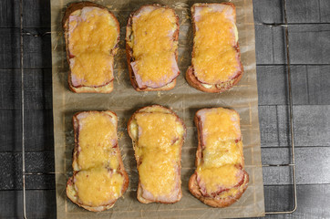 Six sandwiches with meat and cheese top view