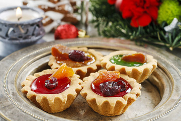 Christmas cookies with jelly and dried fruits.