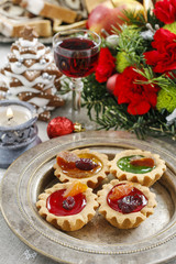 Christmas cookies with jelly and dried fruits.