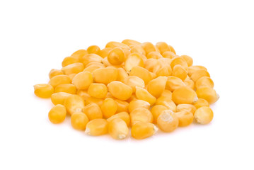 pile of dried corn seeds isolated on white background