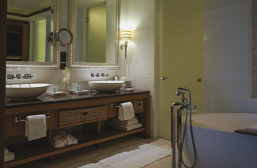 Modern white basin in hotel. Clean hotel bathroom sink and faucet
