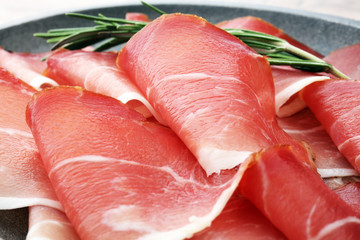 prosciutto with rosemary  or ham of black forest or serrano.