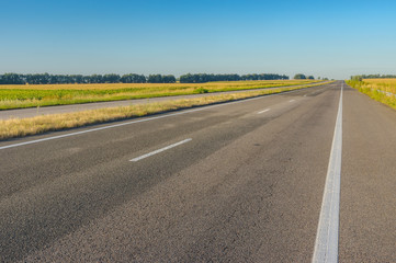 Morning landscape with empty high-way Dnipro-Kharkiv in central Ukraine