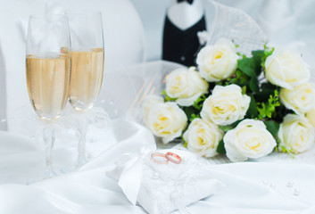 wedding accessories on white background, ring champagne bouquet