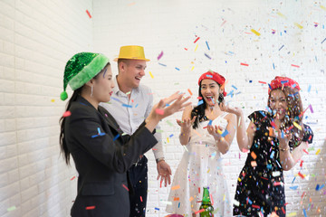 Happy business group people in santa hat having fun for celebrity christmas party.