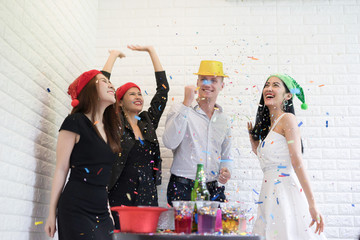 Happy business group people in santa hat having fun for celebrity christmas party.
