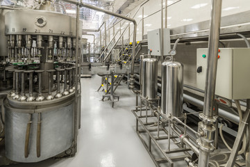 The shop for bottling beverages. Automatic filling line.