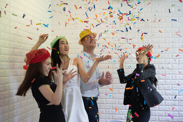 Happy business group people in santa hat having fun for celebrity christmas party.