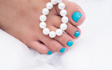 Awesome pedicure, women's feet. Colorful and stylish design.