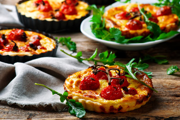 roasted cherry tomato and  goat's cheese quiche.