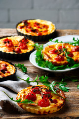 roasted cherry tomato and  goat's cheese quiche.