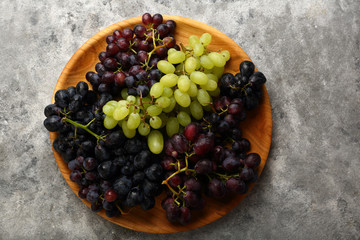 Fresh Grapes mix on wood plate