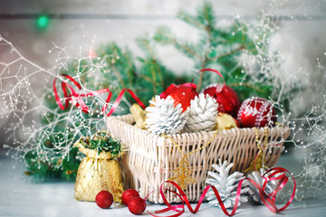 Christmas winter backgrounds, Christmas decorations and spruce branches on a wooden table. Happy New year. Merry Christmas.