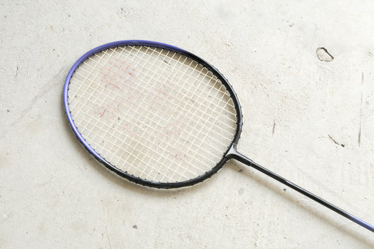 batminton racket on gray background. batminton.