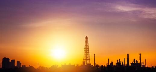 Obraz premium Aerial view oil refinery night background during twilight,Industrial zone,Energy power station.