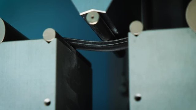 A metal mechanical press tests new material from carbon nanotubes