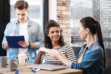 Happy girl looking at another girl