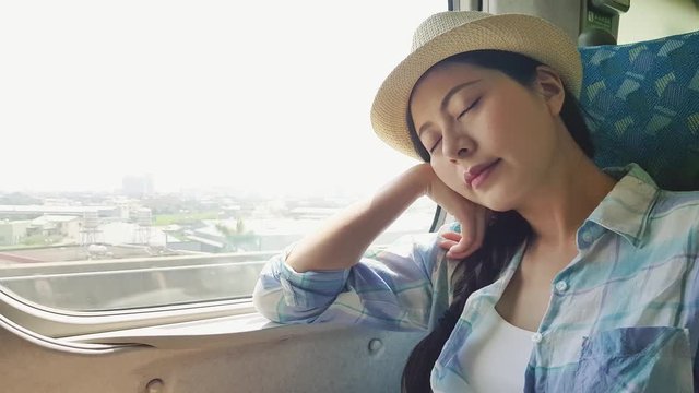 Asian woman traveler take a break asleep