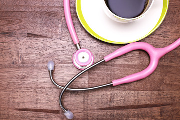 Pink Stethoscope and a cup of coffee