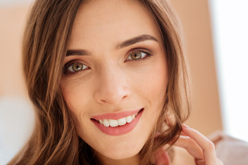 Naklejka premium Close up look on beaming young woman