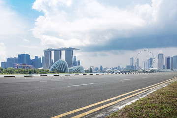 empty asphalt road with cityscape of modern city