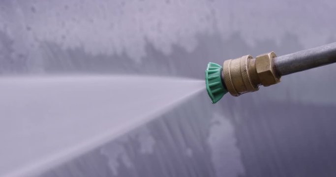 Pressure washer spraying - extreme close up