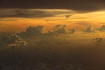 Obraz premium Sunset White Cloud sky at high level attitude, view from window airplane